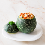 Calabacines redondos rellenos de quinoa y lentejas
